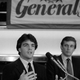 Doug Flutie and “John Baron.” Photo credit: Marty Lederhandler/AP